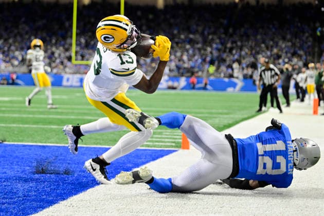 DETROIT, MI - NOVEMBER 27: Green Bay Packers WR Dontayvion Wicks (13) catches a touchdown pass during the game between Green Bay Packers and Detroit Lions on November 27, 2025 at Ford Field in Detroit, MI ( CSM) Detroit United States - ZUMAc04_ 20251127_zma_c04_006 Copyright: xAllanxDranbergx