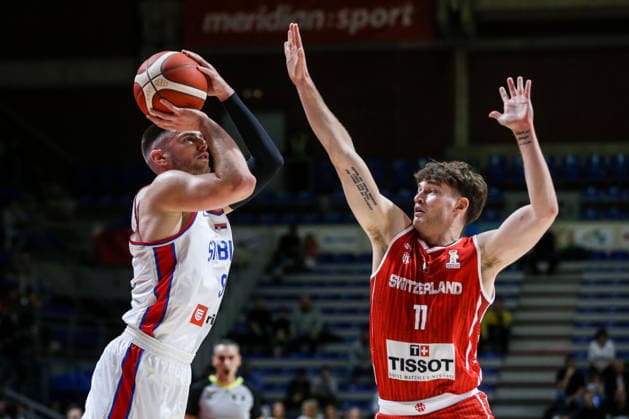 Serbia v Switzerland - FIBA World Cup European Qualifiers BELGRADE, SERBIA - NOVEMBER 27: Stefan Momirov (9) of Serbia in action against Yuri Solca (11) of Switzerland during the FIBA World Cup European Qualifiers group C first round basketball match between Serbia and Switzerland at Aleksandar Nikolic Hall in Belgrade, Serbia on November 27, 2025. Filip Stevanovic Anadolu Belgrade Serbia. Editorial use only. Please get in touch for any other usage.  Copyright: x2025xAnadoluxFilipxStevanovicx