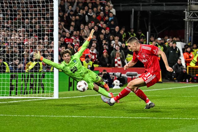 27th November 2025; The City Ground, Nottingham, England; UEFA Europa League Football, Nottingham Forest versus Malmo FF; Nikola Milenkovic of Nottingham Forest scores past Melker Ellborg of Malmo in the 59th minute to make the score 3-0  GodfreyxPitt