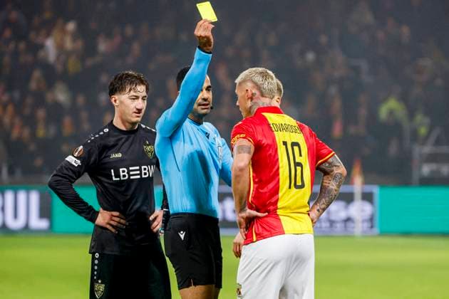 referee Mohammed Al-Hakim shows a yellow card to Victor Edvardsen of Go Ahead Eagles and Angelo Stiller of VfB Stuttgart Go Ahead Eagles v VfB Stuttgart, UEFA Europa League 2025 26 League Phase MD5, Go Ahead Eagles v VfB Stuttgart, Stadion De Adelaarshorst, November 27, 2025, Deventer, Netherlands.
