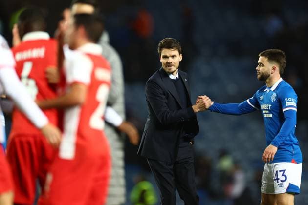 Rangers head coach Danny Röhl shakes hands with Nicolas Raskin after the Europa League league phase match at Ibrox Stadium, Glasgow. Rangers v Braga - UEFA Europa League - League Phase - Ibrox Stadium, Glasgow, Lanarkshire, Scotland, UK - 27 Nov 2025Glasgow Ibrox Lanarkshire United Kingdom  Copyright: xO Rourke RangersxFC Shutterstockx 15953532bw