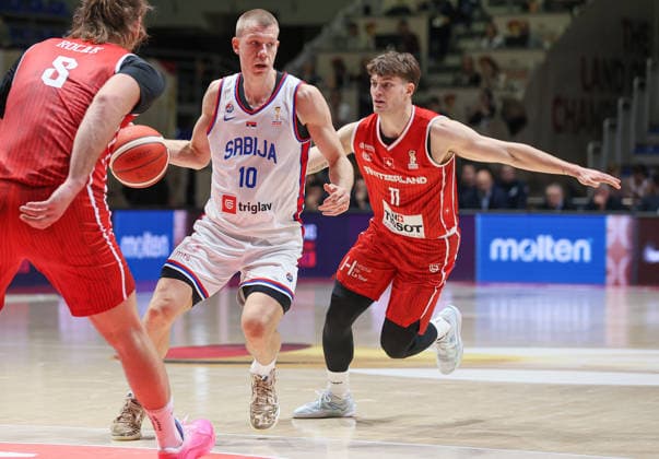 (251128) -- BELGRADE, Nov. 28, 2025 -- Serbia s Ognjen Jaramaz (C) competes during the FIBA basketball World Cup 2027 European qualifiers first round group C match between Serbia and Switzerland in Belgrade, Serbia, Nov. 27, 2025. (Photo by Xinhua) (SP)SERBIA-BELGRADE-BASKETBALL-FIBA-WORLD CUP-QUALIFIER-SERBIA VS SWITZERLAND PredragxMilosavljevic 