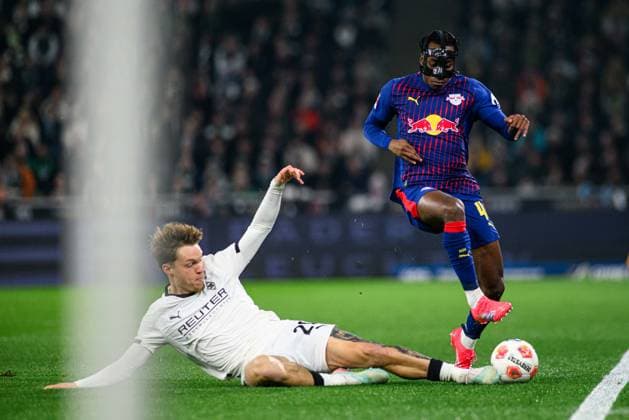 MOENCHENGLADBACH, GERMANY - 28 NOVEMBER, 2025: Joe Scally, Yan Diomande - 1. Bundesliga football match Borussia Moenchengladbach vs RB Leipzig at Borussia Park.  Copyright: xVitaliixKliuievx