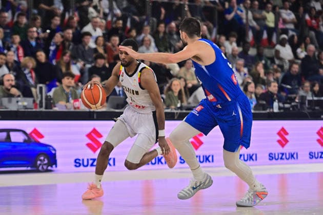 BASKET : France vs Belgique - Rouen - 28 11 2025 Loic Schwartz ( 11 - Belgium ) and Killian Tillie ( 33 - France ) during the FIBA European Qualifiers match between France and Belgium at Kindarena on November 28, 2025 in Rouen, France. ( Photo by Federico Pestellini PSNewz ) - RouenFrance  Copyright: xFedericoxPestellinix