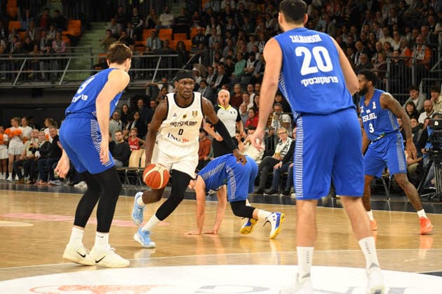 Isaac Bonga (0 Deutschland) in action at the Basketball World Cup qualifying match between Germany and Israel on November 28, 2025, in Neu-Ulm. Neu Ulm ratiopharm Arena Bavaria Germany