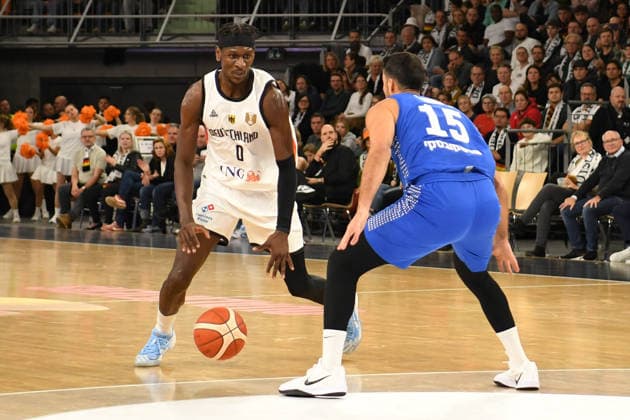 Isaac Bonga (0 Deutschland) and Lior Carreira (15 Israel) in action at the Basketball World Cup qualifying match between Germany and Israel on November 28, 2025, in Neu-Ulm. Neu Ulm ratiopharm Arena Bavaria Germany