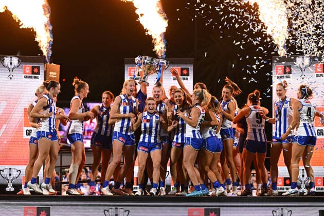 AFLW GRAND FINAL, Kangaroos players and Darren Crocker, Senior Coach of the Kangaroos celebrate on stage with the trophy after defeating the Brisbane Lions to win the AFLW Grand Final match between the North Melbourne Kangaroos and the Brisbane Lions at Ikon Park in Melbourne, Saturday, November 29, 2025. ( NO ARCHIVING, EDITORIAL USE ONLY MELBOURNE VICTORIA AUSTRALIA  Copyright: xJAMESxROSSx 20251129143099614908