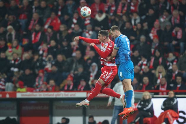 29.11.2025, xtgx, Fussball 1. Bundesliga, 1. FC Union Berlin - 1. FC Heidenheim emspor, v.l. Andrej Ilic (Union Berlin, 23), Patrick Mainka (Heidenheim, 6) Zweikampf, Duell, Kampf, tackle (DFL DFB REGULATIONS PROHIBIT ANY USE OF PHOTOGRAPHS as IMAGE SEQUENCES and or QUASI-VIDEO) Berlin