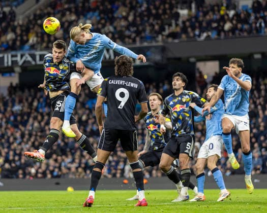 29th November 2025; Etihad Stadium, Manchester, Lancashire, England; Premier League Football, Manchester City versus Leeds United; Erling Haland of Manchester City heads the ball  TimxWilliams