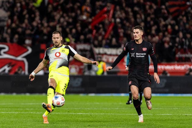 1. Fußball Bundesliga: Bayer 04 Leverkusen - Borussia Dortmund; 29.11.2025 Nico Schlotterbeck (Borussia Dortmund, 4), Patrik Schick (Bayer 04 Leverkusen, 14) 1. Fußball Bundesliga: Bayer 04 Leverkusen - Borussia Dortmund, BayArena, Leverkusen; 29.11.2025 DFL regulations prohibit any use of photographs as image sequences and or quasi video. Copyright: xBEAUTIFULxSPORTS Buriakovx