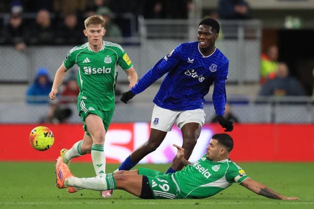 29th November 2025; Hill Dickinson Stadium, Liverpool, England; Premier League Football, Everton versus Newcastle United; Bruno Guimaraes of Newcastle United slides in to tackle Thierno Barry of Everton  DavidxBlunsden
