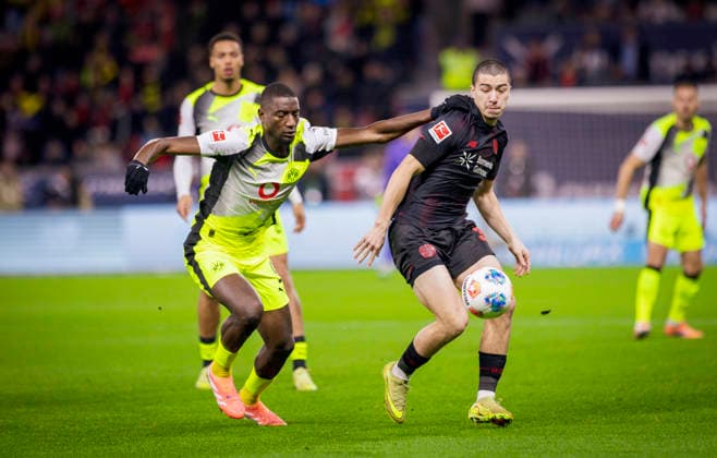 Leverkusen, Germany. 29th Nov 2025. . Serhou Guirassy (BVB) Ibrahim Maza (Leverkusen) Bayer Leverkusen - Borussia Dortmund 29.11.2025
