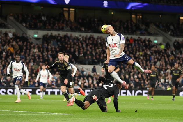 29th November 2025; Tottenham Hotspur Stadium, London, England; Premier League Football, Tottenham Hotspur versus Fulham; Richarlison of Tottenham Hotspur jumps for a header above Kenny Tete of Fulham  KatiexChan