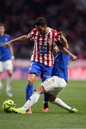 Koke Resurreccion (Atletico de Madrid) and Santi Cazorla (Real Oviedo) battle for the ball during the LaLiga EA Sports match between AtlÃ tico Madrid v Real Oviedo at Estadio Riyadh Air Metropolitano on November 29, 2025 in Madrid, Spain. (Photo by Manu Reino DeFodi Images)