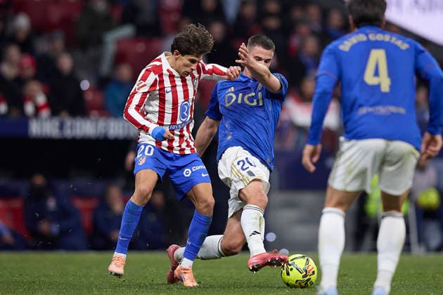 Giuliano Simeone (Atletico de Madrid) and Leander Dendoncker (Real Oviedo) battle for the ball during the LaLiga EA Sports match between AtlÃ tico Madrid v Real Oviedo at Estadio Riyadh Air Metropolitano on November 29, 2025 in Madrid, Spain. (Photo by Manu Reino DeFodi Images)