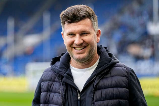 Andreas Schicker (Geschäftsführer Hoffenheim), Einzelbild, Einzelfoto, Aktion, Action, Porträt, Portrait, Freude, freuen, freut sich, freundlich, fröhlich, glücklich, strahlend, optimistisch, 29.11.2025, Sinsheim (Deutschland), Fussball, Bundesliga, TSG 1899 Hoffenheim - FC Augsburg, DFB DFL REGULATIONS PROHIBIT ANY USE OF PHOTOGRAPHS AS IMAGE SEQUENCES AND OR QUASI-VIDEO.