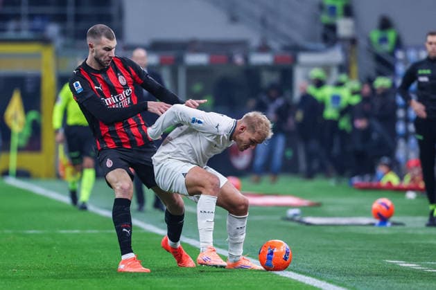 CALCIO - Serie A - AC Milan vs SS Lazio Strahinja Pavlovic of AC Milan competes for the ball with Gustav Isaksen of SS Lazio during Serie A 2025 26 football match between AC Milan and SS Lazio at San Siro Stadium in Milan Milan Italy  Copyright: xIPAxSport ABACAx