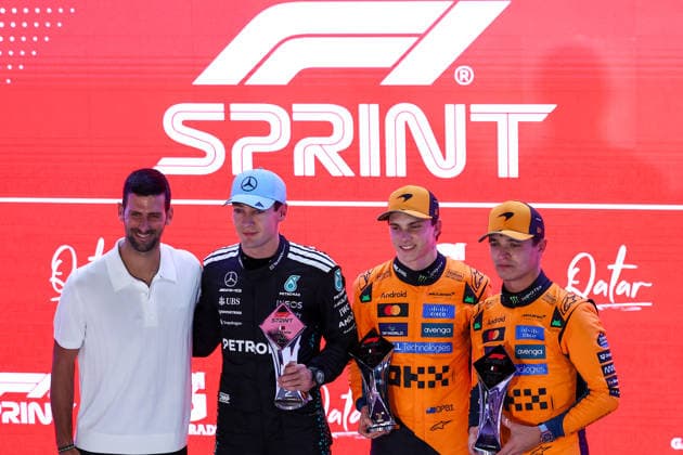 (251130) -- DOHA, Nov. 30, 2025 -- First-placed McLaren s Australian Driver Oscar Piastri (2nd R), second-placed Mercedes British driver George Russell (2nd L) and third-placed McLaren s British driver Lando Norris (1st R) pose with Serbian tennis player Novak Djokovic on the podium after the Sprint race of the Formula One Qatar Grand Prix at the Lusail International Circuit in Doha, Qatar, on Nov. 29, 2025. (Photo by Xinhua) (SP)QATAR-DOHA-F1-GRAND PRIX-SPRINT LixChao 