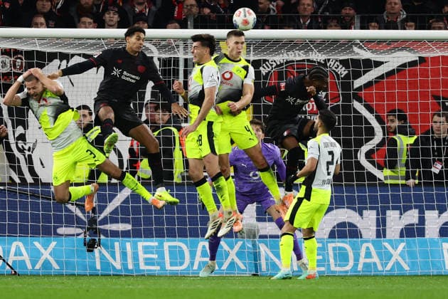 (251130) -- LEVERKUSEN, Nov. 30, 2025 -- Players vie for the ball during the German first division of Bundesliga football match between Bayer 04 Leverkusen and Borussia Dortmund in Leverkusen, Germany, Nov. 29. 2025. (Photo by Xinhua) (SP)GERMANY-LEVERKUSEN-FOOTBALL-BUNDESLIGA-LEVERKUSEN VS DORTMUND JoachimxBywaletz 