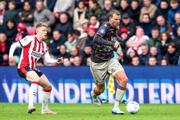 2025-11-30 PSV v FC Volendam - Dutch Eredivisie EINDHOVEN, NETHERLANDS - NOVEMBER 30: Henk Veerman of FC Volendam is challenged by Jerdy Schouten of PSV during the Dutch Eredivisie match between PSV and FC Volendam at Philips Stadion on November 30, 2025 in Eindhoven, Netherlands. Eindhoven Philips Stadion Netherlands Content not available for redistribution in The Netherlands directly or indirectly through any third parties. Copyright: xPieterxvanxderxWoudex