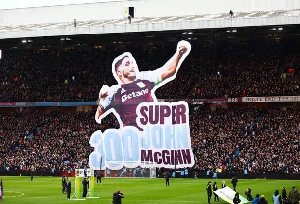 A tifo seen in the stands in reference to John McGinn of Aston Villa making 300 club appearances. Aston Villa v Wolverhampton Wanderers, Premier League, Football, Villa Park, Birmingham, UK - 30 Nov 2025Birmingham Villa Park United Kingdom EDITORIAL USE ONLY No use with unauthorised audio, video, data, fixture lists, club league logos or live services. Online in-match use limited to 120 images, no video emulation. No use in betting, games or single club league player publications.  Copyright: xJamesxMarsh Shutterstockx 15941716ad