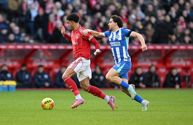 Morgan Gibbs-White of Nottingham Forest and Ferdi Kadioglu of Brighton & Hove Albion Nottingham Forest v Brighton and Hove Albion, Premier League, Football, City Ground, Nottingham, UK - 30 Nov 2025Nottingham City Ground United Kingdom EDITORIAL USE ONLY No use with unauthorised audio, video, data, fixture lists, club league logos or live services. Online in-match use limited to 120 images, no video emulation. No use in betting, games or single club league player publications. Copyright: xAnnaxGowthorpe Shutterstockx 15941749n