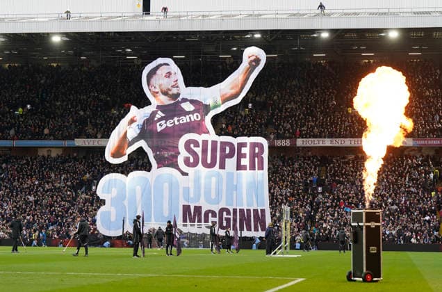 Birmingham, England, 30th November 2025. A Tifo to celebrate John McGinnis 300th game is displayed before the Aston Villa vs Wolverhampton Wanderers Premier League match at Villa Park, Birmingham. Picture credit should read: Andrew Yates Sportimage EDITORIAL USE ONLY. No use with unauthorised audio, video, data, fixture lists, club league logos or live services. Online in-match use limited to 120 images, no video emulation. No use in betting, games or single club league player publications. SPI_009_AY_Villa_Wolves SPI-4336-0009