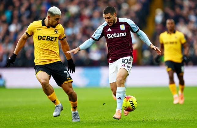 Emi Buend?a of Aston Villan and Andre of Wolverhampton Wanderers. Aston Villa v Wolverhampton Wanderers, Premier League, Football, Villa Park, Birmingham, UK - 30 Nov 2025Birmingham Villa Park United Kingdom EDITORIAL USE ONLY No use with unauthorised audio, video, data, fixture lists, club league logos or live services. Online in-match use limited to 120 images, no video emulation. No use in betting, games or single club league player publications.  Copyright: xJamesxMarsh Shutterstockx 15941716ai