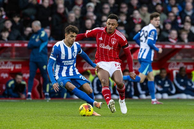 30th November 2025; The City Ground, Nottingham, England; Premier League Football, Nottingham Forest versus Brighton and Hove Albion; Yasin Ayari of Brighton holds off Dan Ndoye of Nottingham Forest  GodfreyxPitt