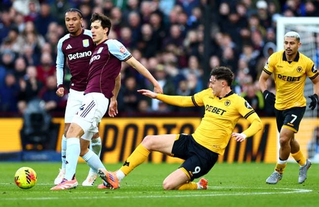 Pau Torres of Aston Villa and Jorgen Strand Larsen of Wolverhampton Wanderers Aston Villa v Wolverhampton Wanderers, Premier League, Football, Villa Park, Birmingham, UK - 30 Nov 2025Birmingham Villa Park United Kingdom EDITORIAL USE ONLY No use with unauthorised audio, video, data, fixture lists, club league logos or live services. Online in-match use limited to 120 images, no video emulation. No use in betting, games or single club league player publications.  Copyright: xJamesxMarsh Shutterstockx 15941716al
