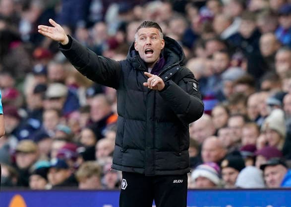 Birmingham, England, 30th November 2025. Rob Edwards manager of Wolverhampton Wanderers directs his players during the Aston Villa vs Wolverhampton Wanderers Premier League match at Villa Park, Birmingham. Picture credit should read: Andrew Yates Sportimage EDITORIAL USE ONLY. No use with unauthorised audio, video, data, fixture lists, club league logos or live services. Online in-match use limited to 120 images, no video emulation. No use in betting, games or single club league player publications. SPI_018_AY_Villa_Wolves SPI-4336-0018