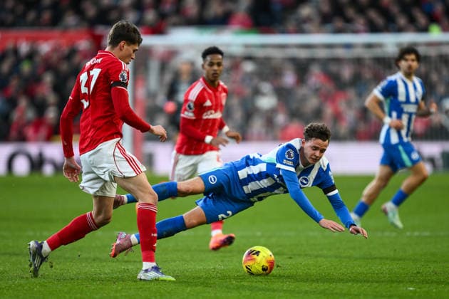 Nottingham, England, 30th November 2025. Maxim De Cuyper of Brighton is fouled by Nicolo Savona of Nottingham Forest during the Nottingham Forest vs Brighton and Hove Albion Premier League match at the City Ground, Nottingham. Picture credit should read: Craig Thomas Sportimage EDITORIAL USE ONLY. No use with unauthorised audio, video, data, fixture lists, club league logos or live services. Online in-match use limited to 120 images, no video emulation. No use in betting, games or single club league player publications. SPI_048_CT_Nottingham_Forest_vs_Brighton_and_Hove_Albion SPI-4337-0059