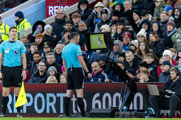 Aston Villa v Wolverhampton Wanderers Premier League 30 11 2025. Referee checks for red card on VAR screen which is Not Given during the Premier League match between Aston Villa and Wolverhampton Wanderers at Villa Park, Birmingham, England on 30 November 2025. Birmingham Villa Park West Midlands England Editorial use only DataCo restrictions apply See www.football-dataco.com , Copyright: xManjitxNarotrax PSI-23320-0038