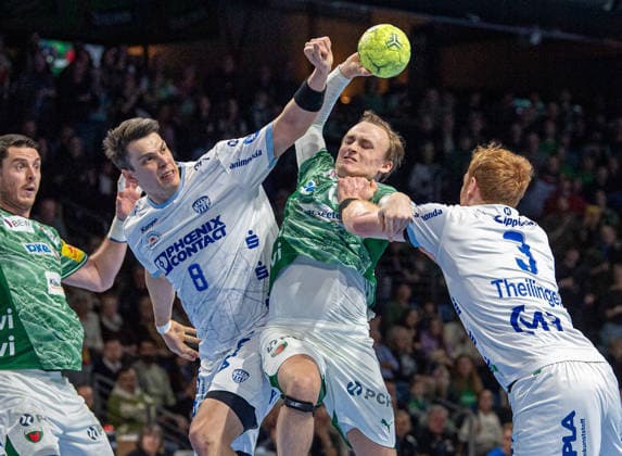 Handball, Herren, Saison 2025 2026, DAIKIN Handball-Bundesliga (14. Spieltag), Füchse Berlin - TBV Lemgo, v.l. Mijajlo Marsenic (Füchse Berlin), Frederik Simak (Lemgo), Tobias Gröndahl (Füchse Berlin), Nicolai Theilinger (Lemgo), 30.11.2025, Copyright: xSebastianxRäppold MatthiasxKochx