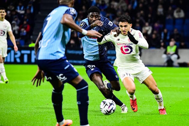 FOOTBALL : AC Le Havre vs Lille OSC - Ligue 1 McDonald s - JournÃ e 14 - 30 11 2025 Osame Sahraoui (Lille OSC) Simon Ebonog (AC Le Havre) Le HavreFrance  Copyright: xBaptistexAutissierx