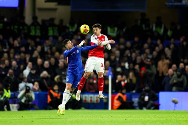 Chelsea v Arsenal Premier League 30 11 2025. Martin Zubimendi (36) of Arsenal tussles with Enzo Fernandez (8) of Chelsea during the Premier League match between Chelsea and Arsenal at Stamford Bridge, London, England on 30 November 2025. Editorial use only DataCo restrictions apply See www.football-dataco.com , Copyright: xNigelxKeenex PSI-23310-0039