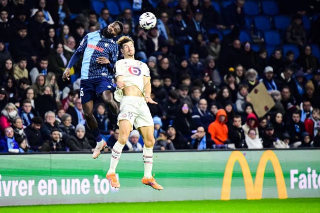 FOOTBALL : AC Le Havre vs Lille OSC - Ligue 1 McDonald s - JournÃ e 14 - 30 11 2025 Issa SoumarÃ (AC Le Havre) Thomas Meunier (Lille OSC) Le HavreFrance  Copyright: xBaptistexAutissierx