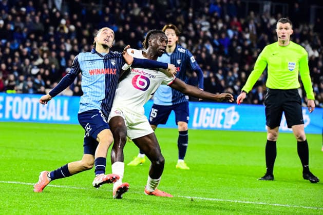 FOOTBALL : AC Le Havre vs Lille OSC - Ligue 1 McDonald s - JournÃ e 14 - 30 11 2025 Yassine Kechta (AC Le Havre) Ngal™ayel Mukau (Lille OSC) Le HavreFrance  Copyright: xBaptistexAutissierx
