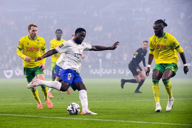 Olympique Lyonnais v FC Nantes - Ligue 1 McDonald s 2025 2026 03 Nicolas COZZA (fcn) - 06 Chidozie AWAZIEM (fcn) - 05 Orel MANGALA (ol) during the Ligue 1 McDonald s match between Olympique Lyonnais and FC Nantes at Groupama Stadium on November 30, 2025 in Lyon, France. Lyon France  Copyright: xFEPx 776348216