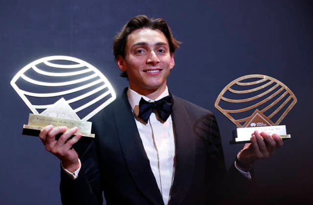 (251201) -- MONTE CARLO, Dec. 1, 2025 -- Sweden s world pole vault champion Armand Duplantis poses with the Men s World athlete of the year award and Men s field athlete of the year award during the World Athletics Awards 2025 in Monte Carlo, Monaco, Nov. 30, 2025. ) (SP)MONACO-MONTE CARLO-ATHLETICS-WORLD AWARDS GaoxJing 