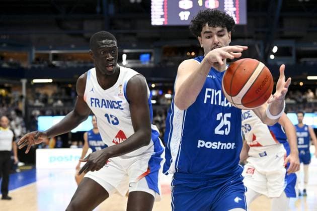 Bodian Massa of France (left) and Mustapha Amzil of Finland in action during men s FIBA World Cup basketball qualifying match Finland vs France in Espoo, Finland on December 1, 2025. Espoo Finland LKFTJK20251201184318TSMU  Copyright: xMikkoxStigx LKFTJK20251201184318TSMU