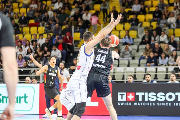FIBA World Cup Qualifiers : Cyprus vs Germany DAVID KRAMER of Germany tries to pass the ball. Cyprus plays vs Germany for the Group E of the FIBA Basketball World Cup European Qualifiers, at Spyros Kyprianou Arena, Limassol, Cyprus, on Dec. 1, 2025.. Cyprus plays vs Germany for the Group E of the FIBA Basketball World Cup European Qualifiers, at Spyros Kyprianou Arena, Limassol, Cyprus, on Dec. 1, 2025. Limassol Cyprus Copyright: xKOSTASxPIKOULASx