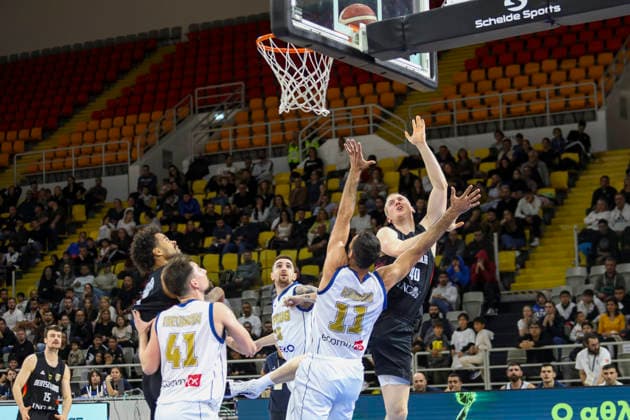 FIBA World Cup Qualifiers : Cyprus vs Germany COLLIN WELP of Germany scores in front of MICHALIS KOUMIS of Cyprus. Cyprus plays vs Germany for the Group E of the FIBA Basketball World Cup European Qualifiers, at Spyros Kyprianou Arena, Limassol, Cyprus, on Dec. 1, 2025. Limassol Cyprus Copyright: xKOSTASxPIKOULASx