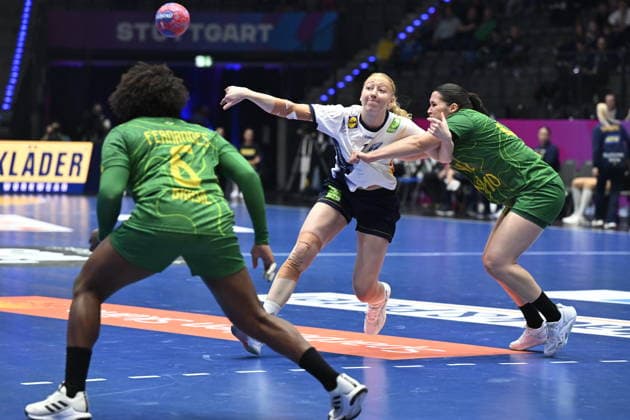 STUTTGART, GERMANY 20251201 Sweden s Nina Koppang against Brazil s Marcela Santos Arounian during Monday s group stage match in Group G of the Women s Handball World Championship, WM, Weltmeisterschaft between Sweden and Brazil at the Porsche Arena in Stuttgart, Germany.