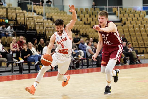 BASKETBALL - FIBA WC Quali, AUT vs LAT VIENNA,AUSTRIA,01.DEC.25 - BASKETBALL - FIBA Basketball World Cup 2027,Qualifiers, international match, Länderspiel, Nationalmannschaft Austria vs Latvia. Image shows Daniel Friedrich (AUT) and Karlis Silins (LAT).  GEPAxpictures xArminxRauthner