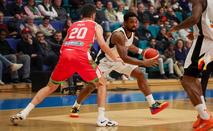 Hungarian Zoltan Perl and Belgium s Retin Obasohan fight for the ball during a basketball match between Belgian national team, Nationalteam Belgian Lions and Hungary, Monday 01 December 2025 in Mons, qualifier 2 6 for the men s 2027 FIBA World Championships. VIRGINIExLEFOUR  x145714924x