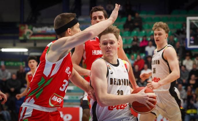 Hungarian Adam Somogyi and Belgium s Siebe Ledegen fight for the ball during a basketball match between Belgian national team, Nationalteam Belgian Lions and Hungary, Monday 01 December 2025 in Mons, qualifier 2 6 for the men s 2027 FIBA World Championships. VIRGINIExLEFOUR  x145715554x