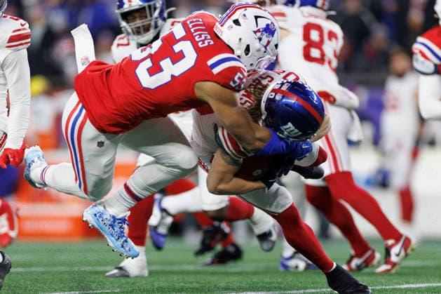 New England Patriots linebacker Christian Elliss (L) takes down New York Giants wide receiver Gunner Olszewski (R) during the first half at Gillette Stadium in Foxborough, Massachusetts on Monday, December 01, 2025.  BOP20251201011 CJxGUNTHER
