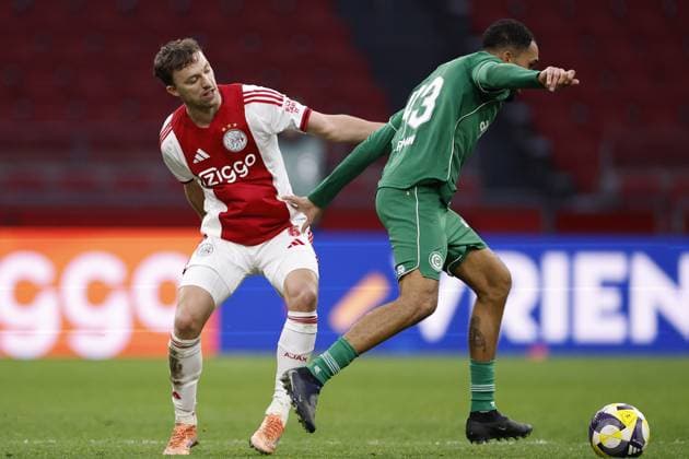 AMSTERDAM - (l-r) Youri Regeer of Ajax, Marvin Peersman of FC Groningen during the Dutch Eredivisie match between AFC Ajax and FC Groningen at the Johan Cruijff ArenA on December 2, 2025, in Amsterdam, Netherlands. ANP Hollandse Hoogte MAURICE VAN STEEN Eredivisie 2025-2026 xVIxANPxSportx xMauricexvanxSteenxIVx 543682550 originalFilename: 543682550.jpg