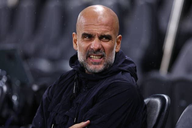 London, England, 2nd December 2025. Pep Guardiola, Manager of Manchester City sits in the dugout before the Fulham vs Manchester City Premier League match at Craven Cottage, London. Picture credit should read: Paul Terry Sportimage EDITORIAL USE ONLY. No use with unauthorised audio, video, data, fixture lists, club league logos or live services. Online in-match use limited to 120 images, no video emulation. No use in betting, games or single club league player publications. SPI_009_PT_Fulham_Man_City SPI-4339-0009